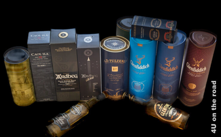 Das Feature Bild für den Beitrag Whisky und Schottland zeigt viele verschiedene schottische Whiskys.